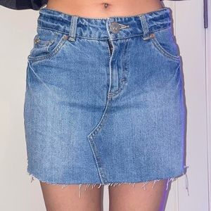 Levi’s Jean mini skirt with small built-in black shorts inside